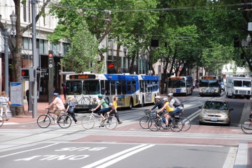 Portland_Transit_Mall_with_cyclists_crossing.jpg