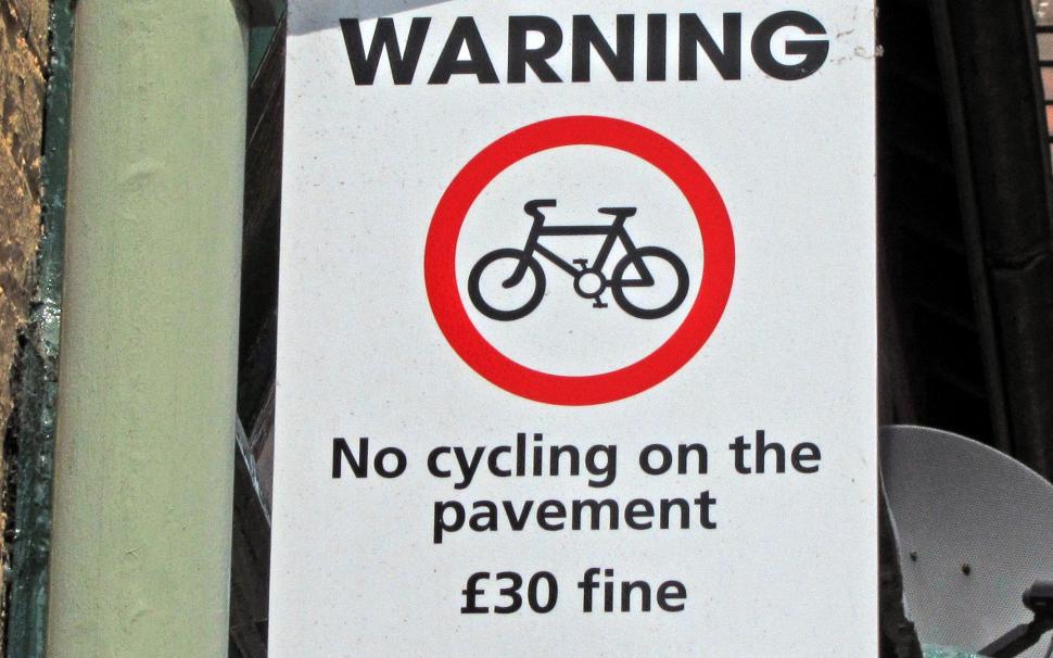 No cycling on the pavement sign (CC licensed by Leo Reynolds:Flickr)