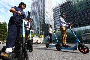 Georgia Yexley (TIER), Mayor Philip Glanville (London Councils), Helen Sharp (TfL), Duncan Robertson (Dott) on e-scooters.jpg
